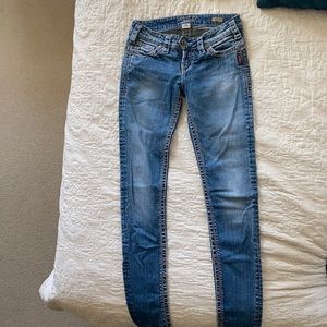 Silver low rise skinny jeans size 26